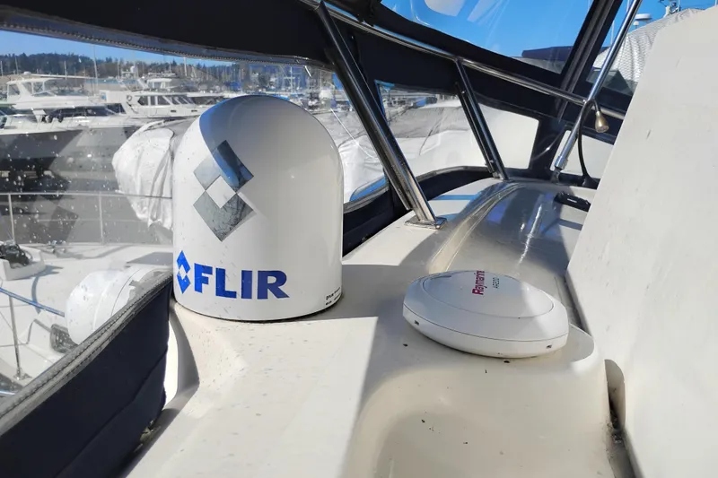 Slide: The Image of 1988 PT 52 AFT Cabin Motor Yacht with FLIR and Raymarine equipment on deck. - 23