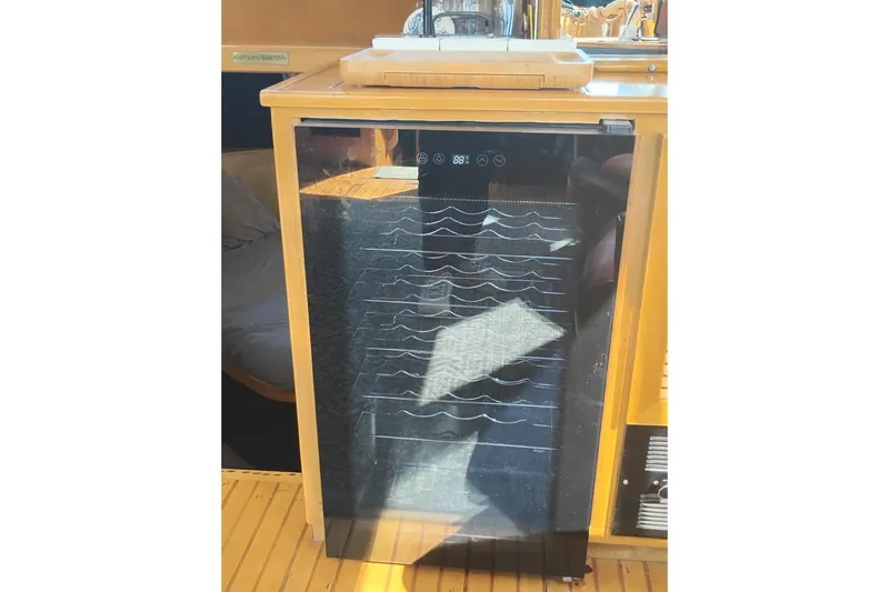 Slide: The Image of Wine cooler in the 1988 PT 52 AFT Cabin Motor Yacht's interior kitchen area. - 37