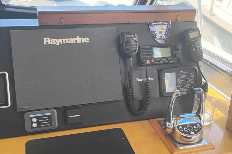 Slide: The Image of Control panel of a 1988 PT 52 AFT Cabin Motor Yacht with Raymarine equipment. - 45