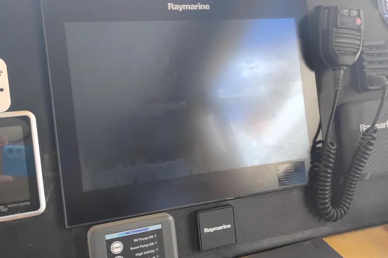 Slide: The Image of Control panel of 1988 PT 52 AFT Cabin Motor Yacht with Raymarine display. - 46