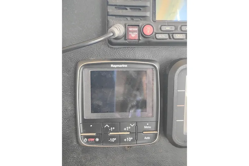 Slide: The Image of Raymarine navigation equipment on 1988 PT 52 AFT Cabin Motor Yacht dashboard. - 47