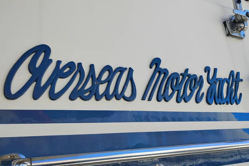 Slide: The Image of 1988 PT 52 AFT Cabin Motor Yacht with "Overseas Motor Yacht" lettering. - 5