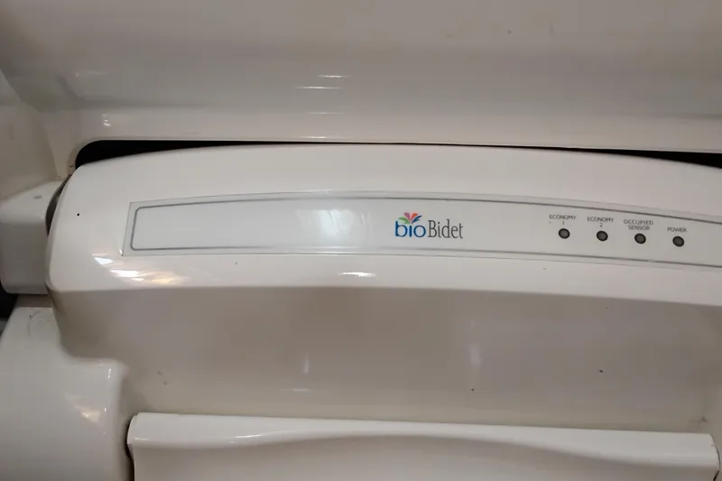Slide: The Image of BioBidet control panel with economy and power settings on a PT 52 AFT Cabin Motor Yacht. - 68