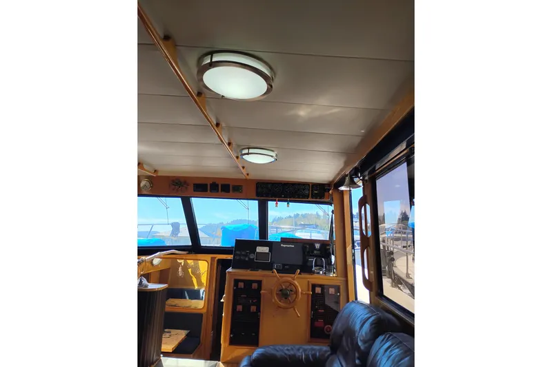 Slide: The Image of Interior view of 1988 PT 52 AFT Cabin Motor Yacht helm with navigation equipment. - 72