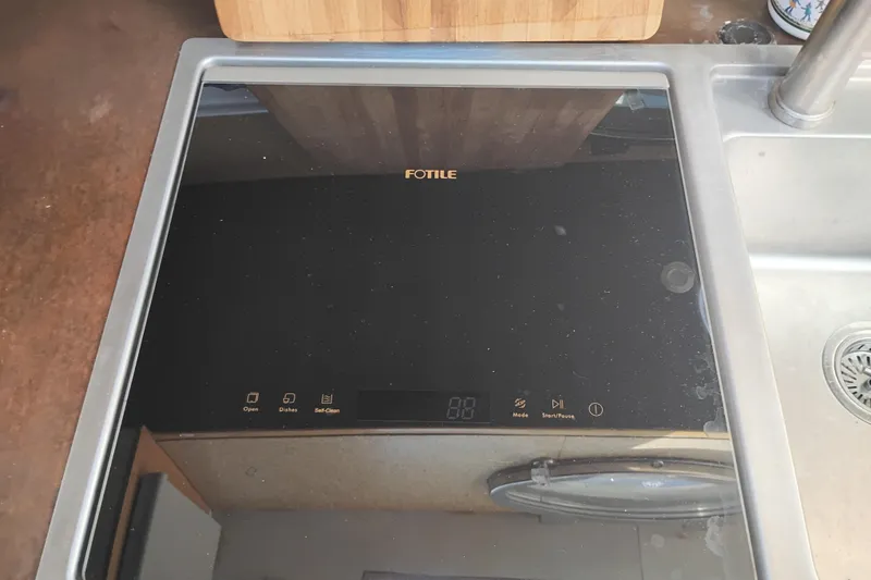 Slide: The Image of Modern kitchen sink with integrated Fotile appliance on PT 52 AFT Cabin Motor Yacht. - 82