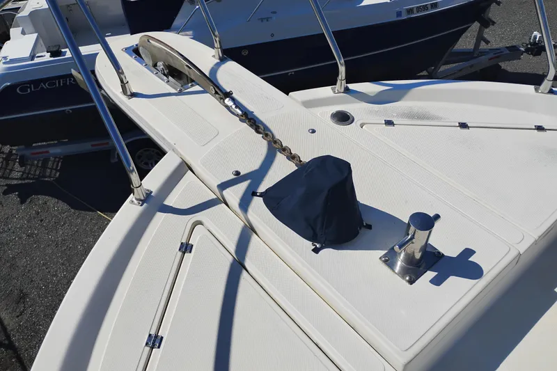 Slide: The Image of 1988 PT 52 AFT Cabin Motor Yacht deck with anchor chain and cleat. - 99