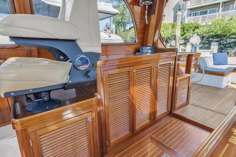 Slide: The Image of Luxurious interior of 2007 Gorbon Custom Downeast 40 yacht with wooden cabinetry and seating. - 41