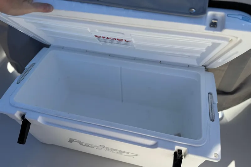 Slide: The Image of Open Engel cooler on 2023 Parker 21SE Center Console boat. - 18
