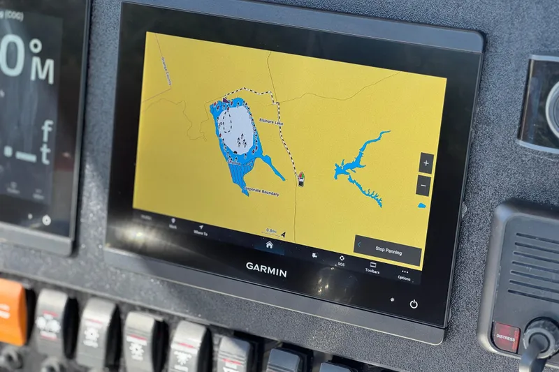 Slide: The Image of Garmin navigation display on 2023 Parker 21SE Center Console boat dashboard. - 32