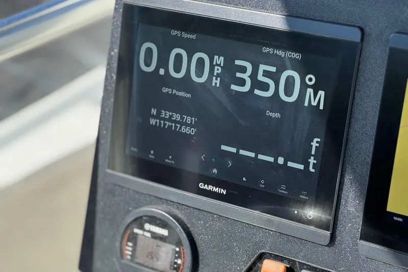 Slide: The Image of Garmin GPS display on 2023 Parker 21SE Center Console boat dashboard. - 33