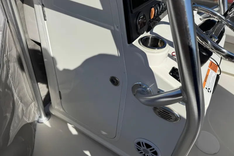 Slide: The Image of 2023 Parker 21SE Center Console boat interior with steering wheel and control panel. - 35