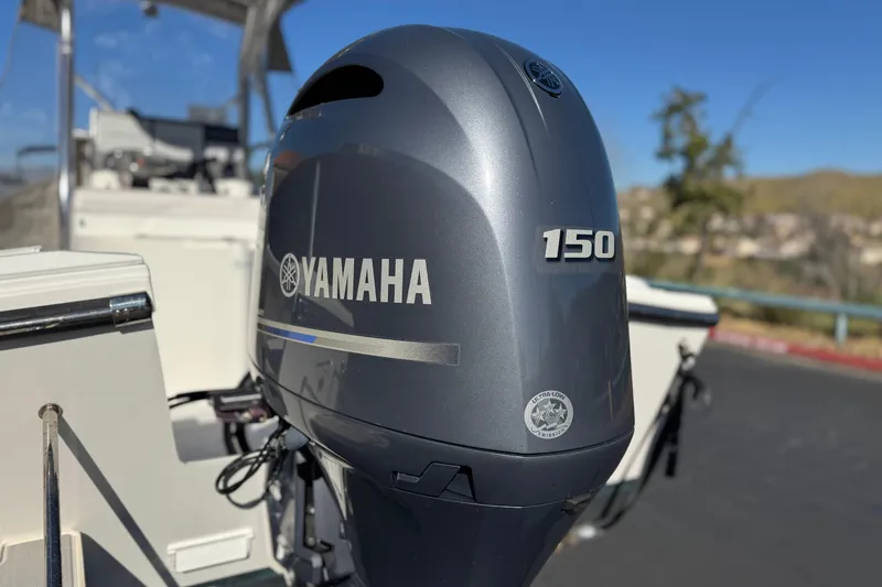 Slide: The Image of Yamaha 150 outboard motor on 2023 Parker 21SE Center Console boat. - 7