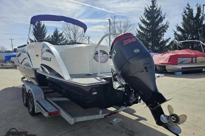 Slide: The Image of 2014 Caravelle 247 UU Razor E-Toon boat with Suzuki 250 outboard motor. - 33