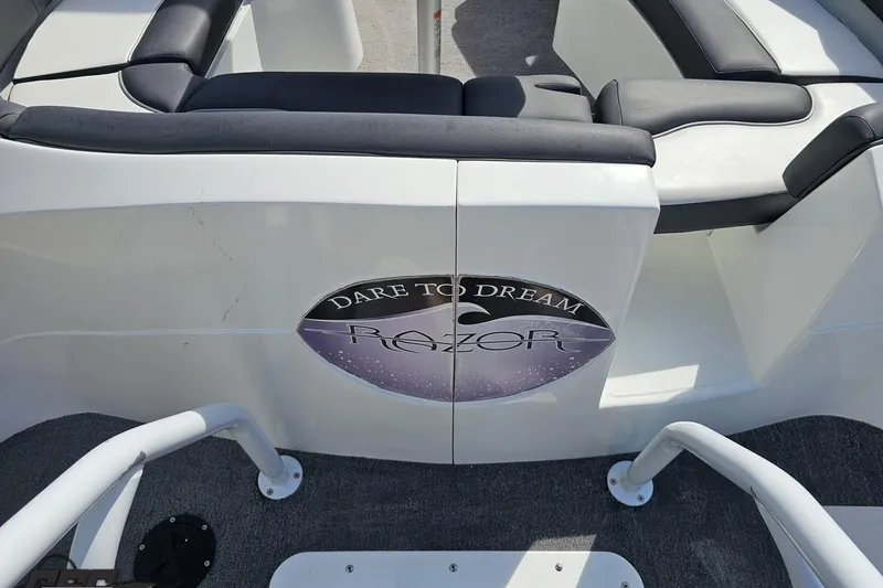 Slide: The Image of 2014 Caravelle 247 UU Razor E-Toon boat interior with "Dare to Dream" logo. - 40