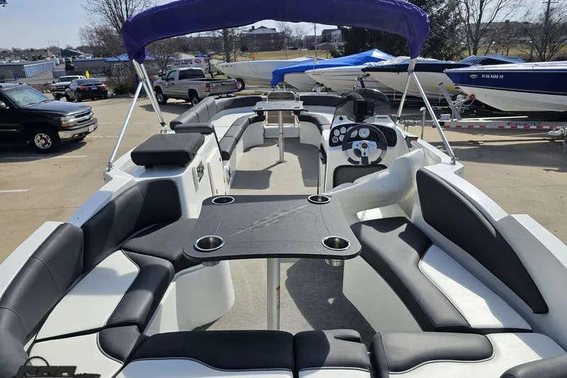 Slide: The Image of 2014 Caravelle 247 UU Razor E-Toon boat with spacious seating and modern dashboard. - 41