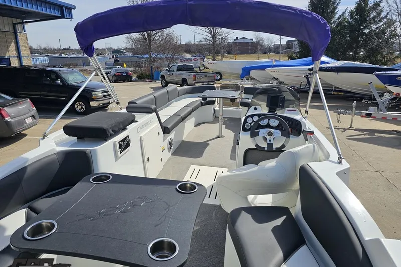 Slide: The Image of 2014 Caravelle 247 UU Razor E-Toon boat with spacious seating and modern dashboard. - 43