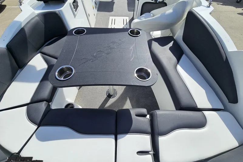 Slide: The Image of Interior of 2014 Caravelle 247 UU Razor E-Toon boat with seating and table. - 45