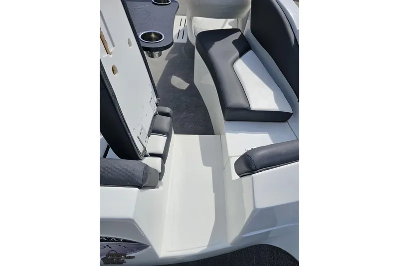 Slide: The Image of Interior seating of 2014 Caravelle 247 UU Razor E-Toon boat with cup holders. - 46