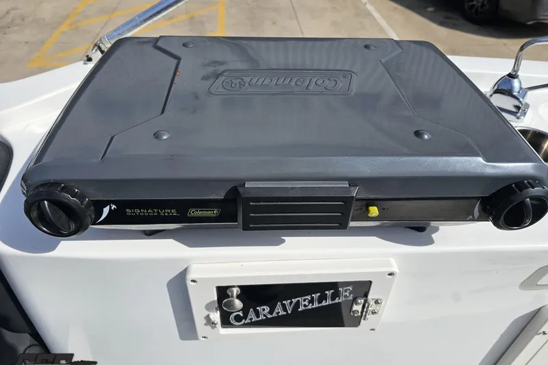 Slide: The Image of Coleman outdoor stove on 2014 Caravelle 247 UU Razor E-Toon boat deck. - 57