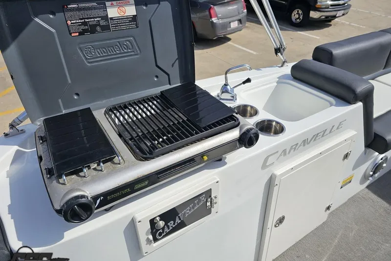 Slide: The Image of Outdoor grill setup on 2014 Caravelle 247 UU Razor E-Toon boat deck. - 58