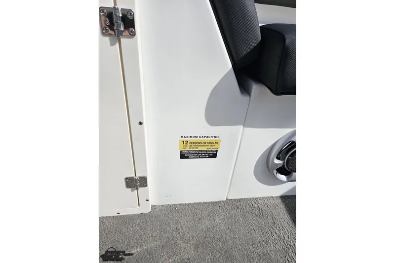 Slide: The Image of 2014 Caravelle 247 UU Razor E-Toon boat capacity label, seating for 12 persons. - 61