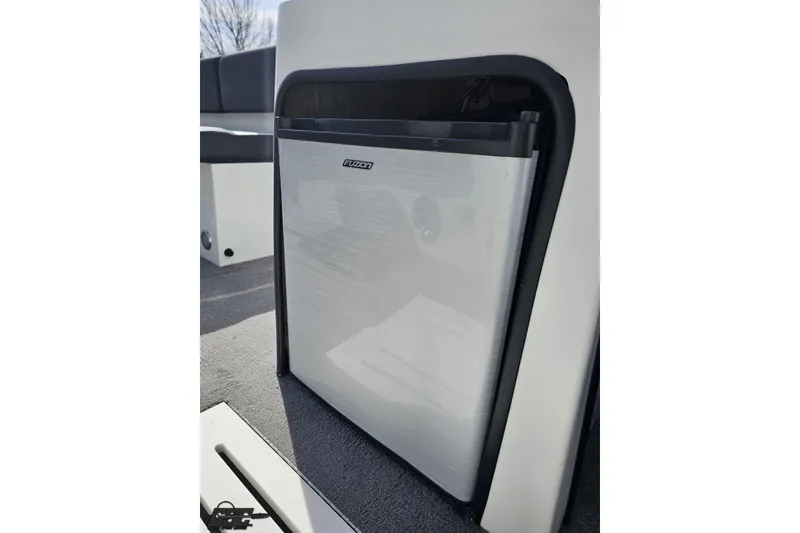 Slide: The Image of Built-in fridge on 2014 Caravelle 247 UU Razor E-Toon boat, featuring sleek design. - 64