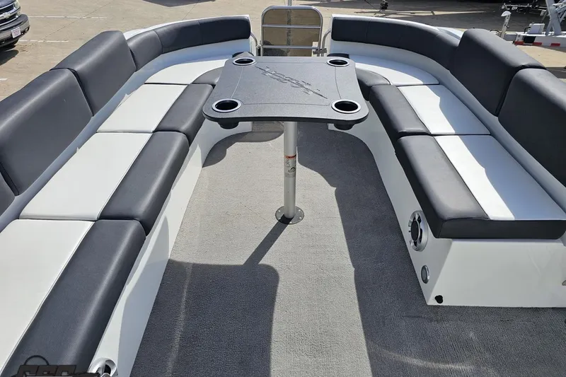 Slide: The Image of 2014 Caravelle 247 UU Razor E-Toon boat interior with seating and table. - 65