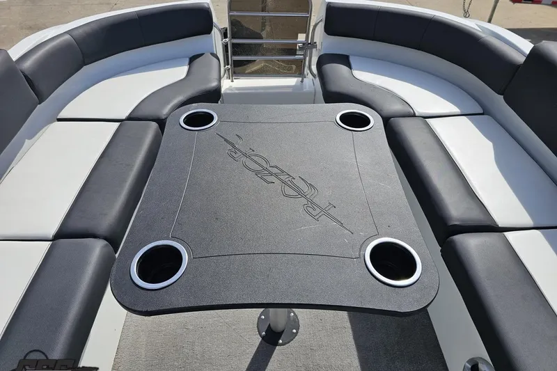 Slide: The Image of Interior of 2014 Caravelle 247 UU Razor E-Toon boat with seating and table. - 66