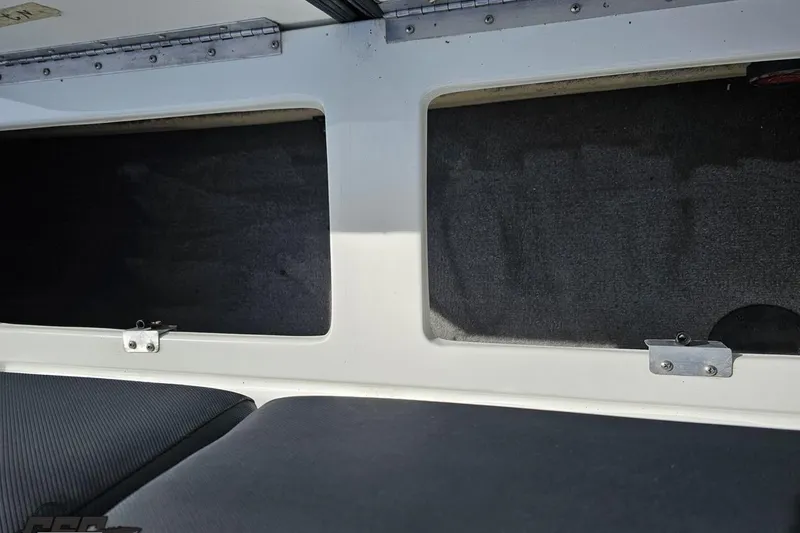 Slide: The Image of Interior storage compartment of 2014 Caravelle 247 UU Razor E-Toon boat. - 73