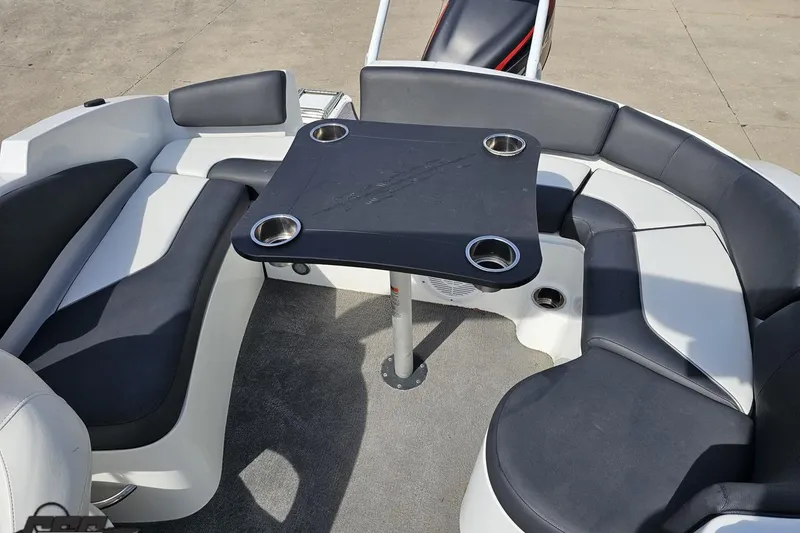 Slide: The Image of 2014 Caravelle 247 UU Razor E-Toon boat interior with seating and table. - 82