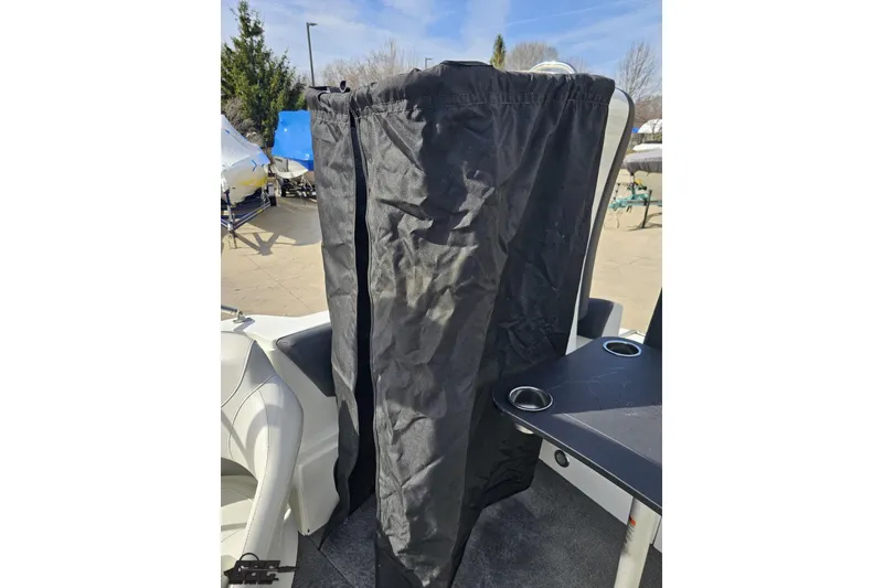 Slide: The Image of 2014 Caravelle 247 UU Razor E-Toon boat with privacy curtain and seating area. - 86