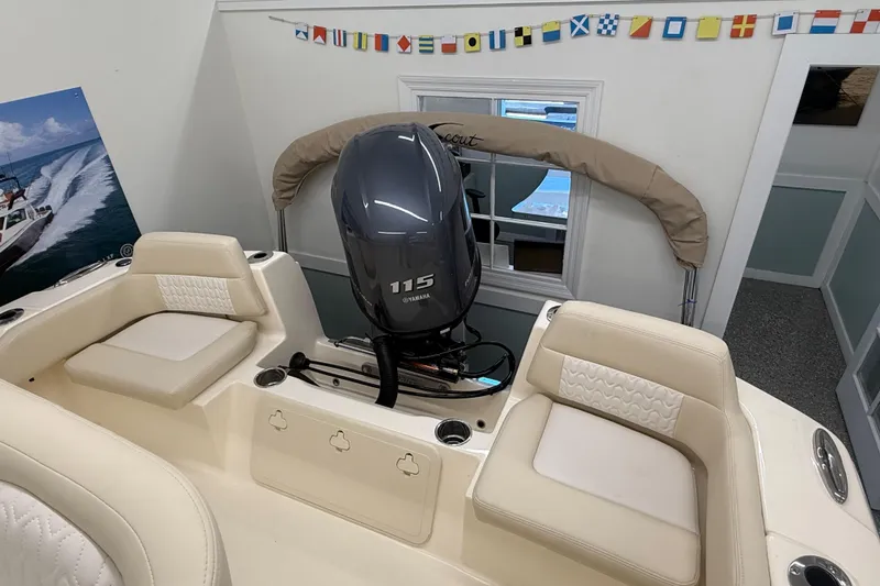 Slide: The Image of 2026 Scout 195 Sportfish boat with Yamaha 115 engine in showroom. - 5