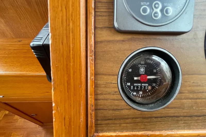 Slide: The Image of Engine hour meter on 1982 Grand Banks 32 Sedan boat dashboard, showing 4270 hours. - 16