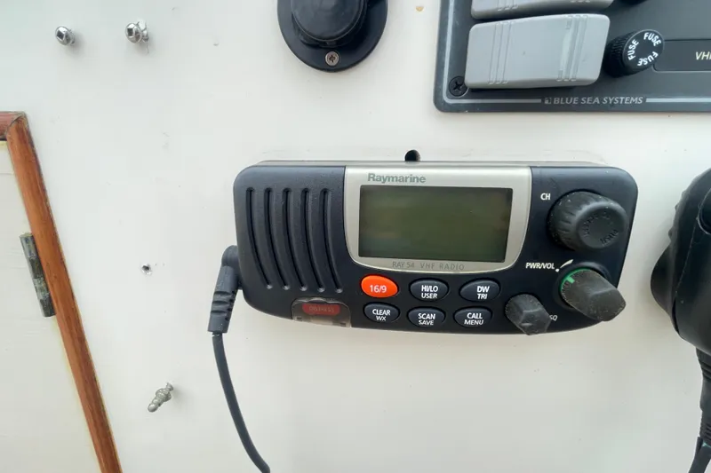 Slide: The Image of Raymarine VHF radio on 1982 Grand Banks 32 Sedan boat dashboard. - 49
