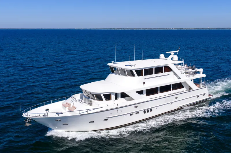 The Image of Luxurious 2006 Jefferson Starship 82 yacht cruising on open blue sea. - 2