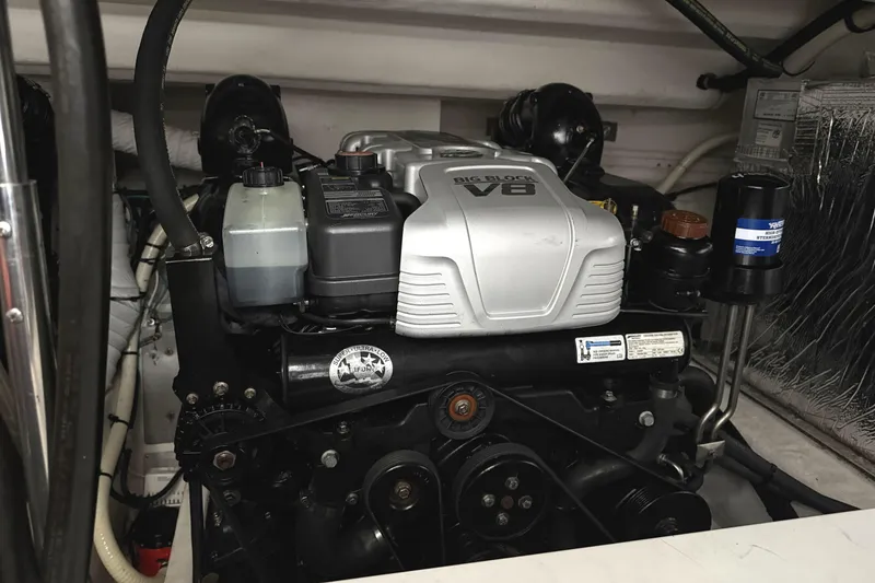 Slide: The Image of Engine compartment of 2017 Cruisers Yachts 390 Express Coupe with Big Block V8 engine. - 31