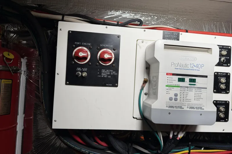 Slide: The Image of Electrical panel and ProNautic charger on 2017 Cruisers Yachts 390 Express Coupe. - 33