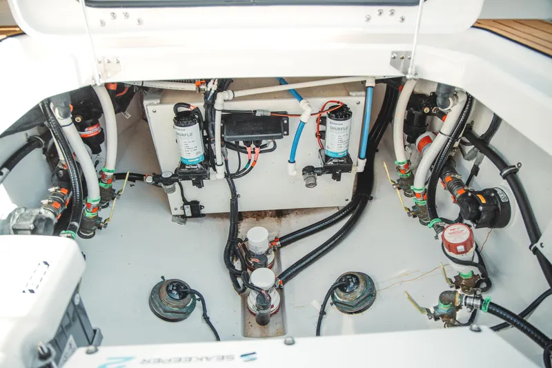 Slide: The Image of Interior view of 2024 Everglades 315 Center Console boat engine. - 23