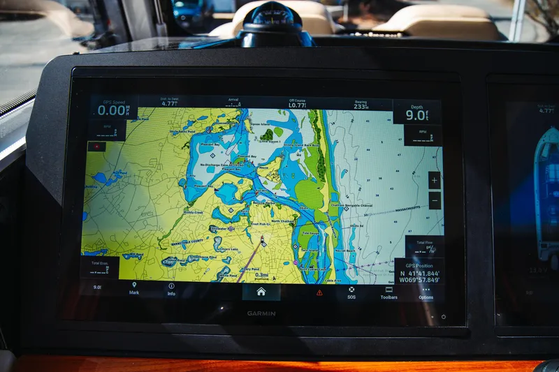 Slide: The Image of Navigation display on 2024 Everglades 315 Center Console boat, showing detailed marine map. - 31