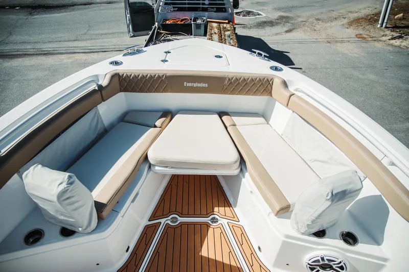 Slide: The Image of 2024 Everglades 315 Center Console boat with luxurious seating and teak flooring. - 33