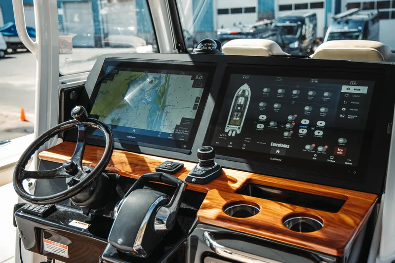 Slide: The Image of 2024 Everglades 315 Center Console dashboard with advanced navigation and control systems. - 36