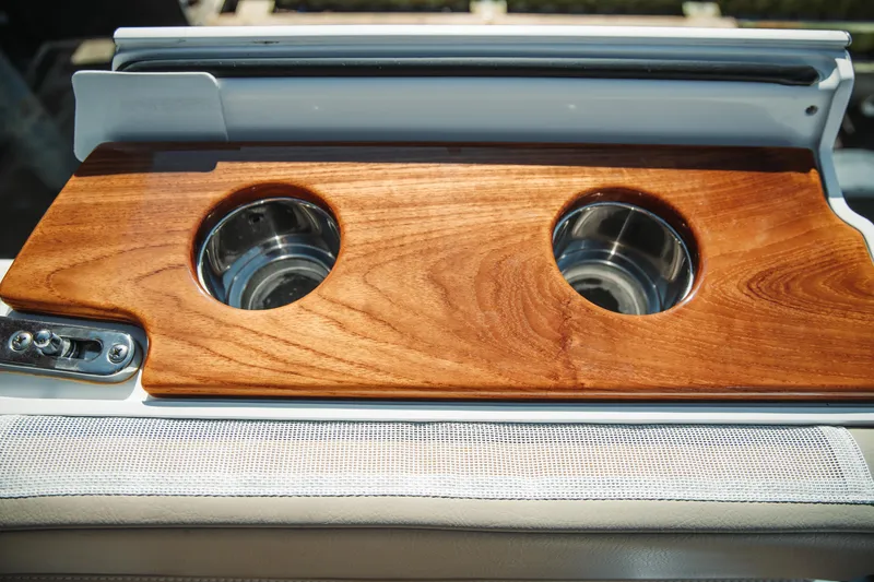 Slide: The Image of 2024 Everglades 315 Center Console boat with wooden cup holders. - 54