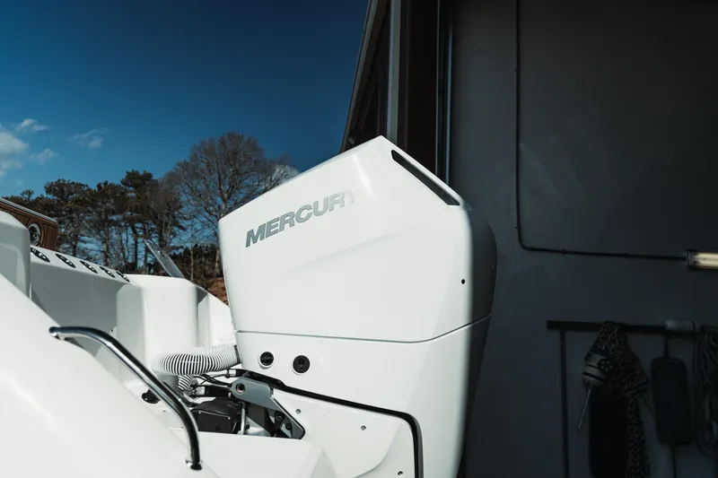 Slide: The Image of 2024 Everglades 315 Center Console with Mercury engine, docked outdoors. - 78