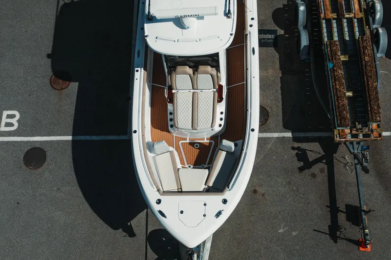 Slide: The Image of Overhead view of 2024 Everglades 315 Center Console boat on trailer. - 8