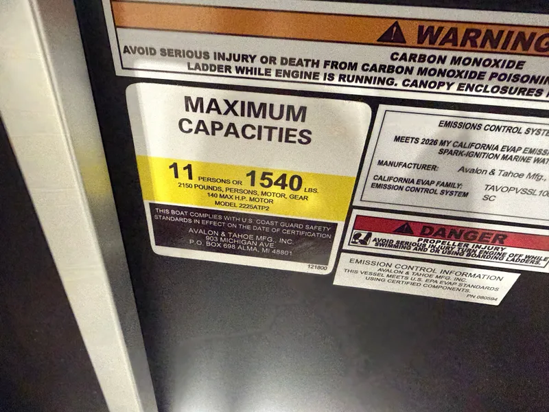 Slide: The Image of Warning labels and capacity details for Tahoe Sport VRB 2385 boat. - 14
