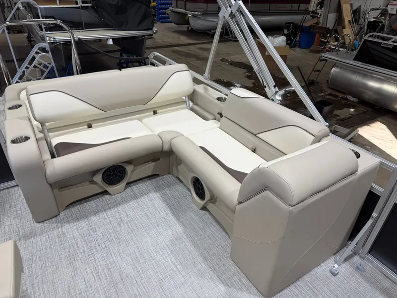 Slide: The Image of 2025 Tahoe Sport VRB 2385 interior with beige seating. - 17
