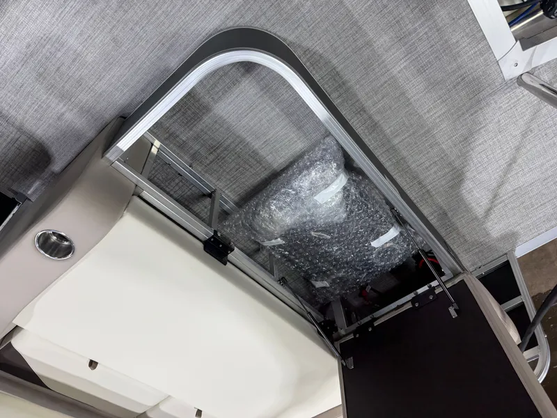 Slide: The Image of 2025 Tahoe Sport VRB 2385 Swingback interior view, gray flooring. - 24