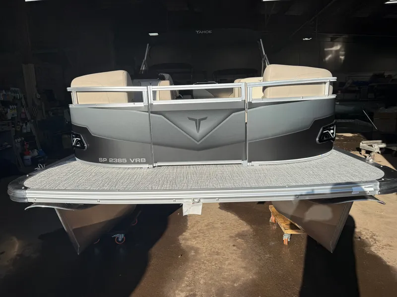 Slide: The Image of 2025 Tahoe Sport VRB 2385 Swingback pontoon boat, front view - 35
