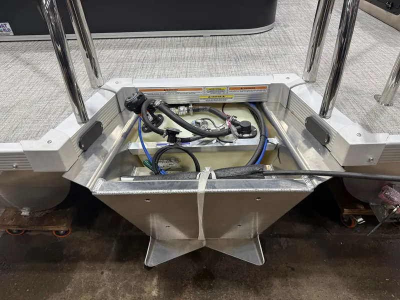 Slide: The Image of 2025 Tahoe Sport VRB 2385 boat engine compartment with wiring. - 41
