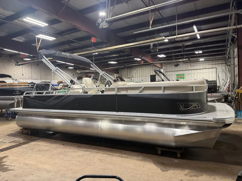 Slide: The Image of 2025 Tahoe Sport VRB 2385 pontoon boat in warehouse. - 45